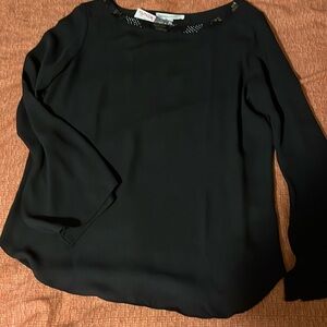 Woman’s pull scoop neck blouse long sleeve with beaded neckline